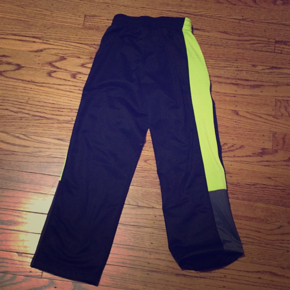 Black and yellow sweat pants